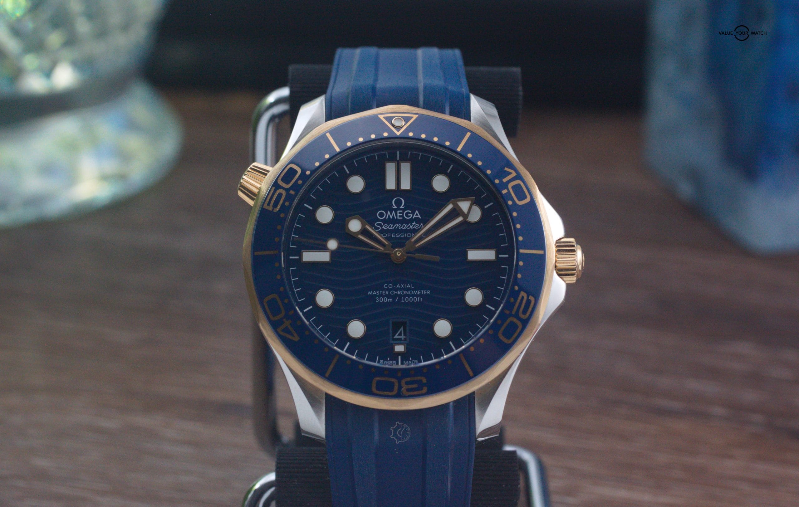 Omega Seamaster 300m Yellow Gold Ceramic 42mm Blue Stainless Steel Box & Papers