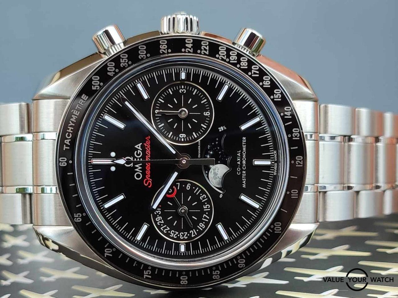 Omega Speedmaster Moonphase 2022 ceramic 44mm automatic watch on steel bracelet B&P