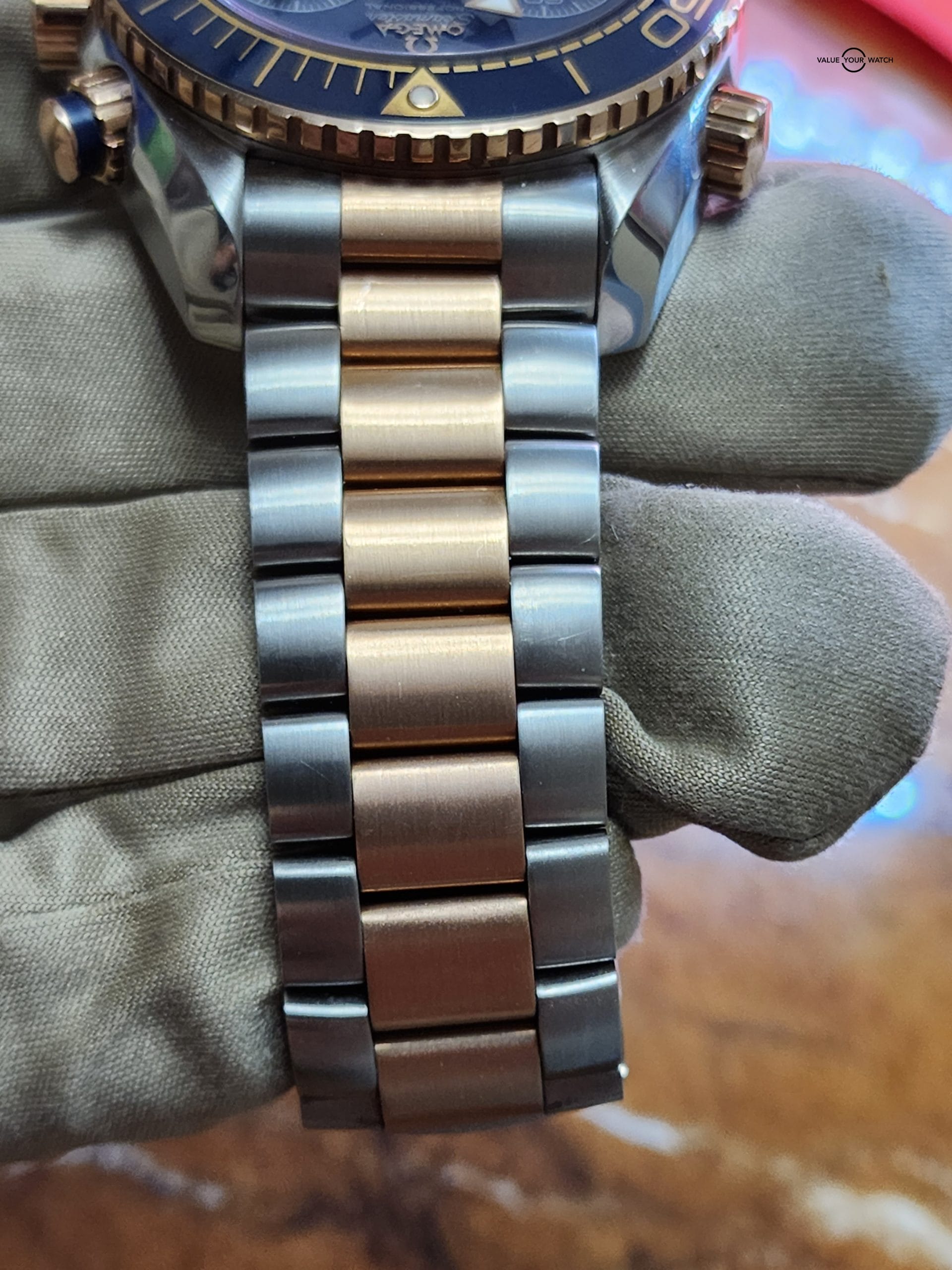 Omega Seamaster Planet Ocean steel and rose gold - Image 7