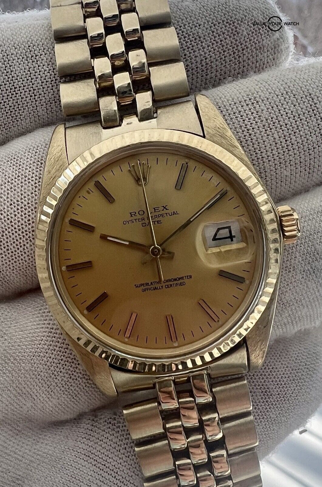 Rolex Oyster Perpetual Date 34mm 14K Gold Champagne Dial