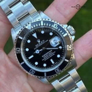 Serviced 2002 Rolex Submariner Date 16610 original papers and 4 service records!