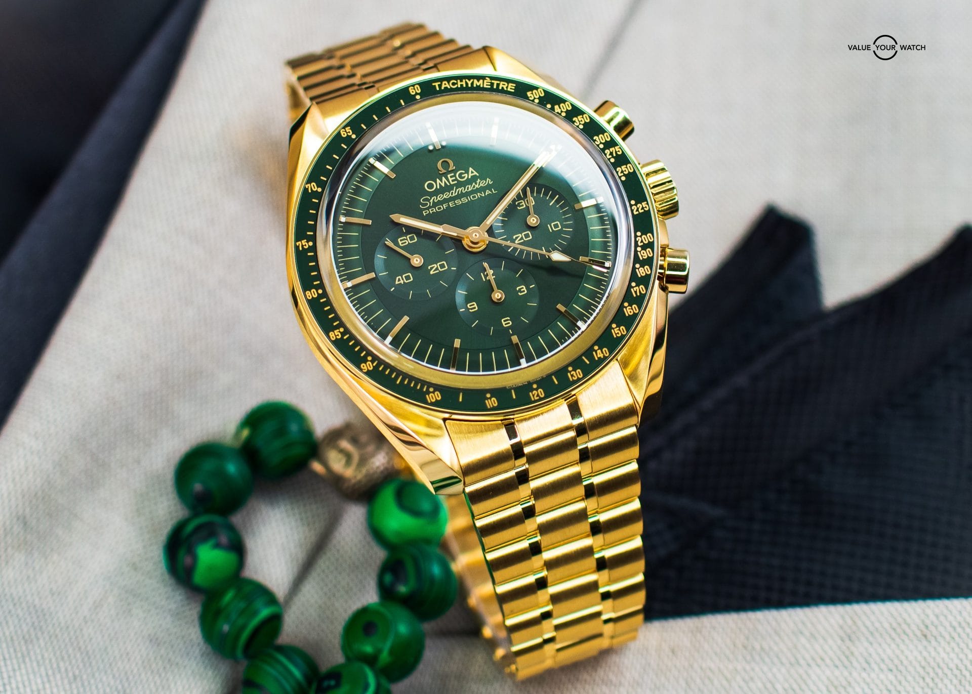 NEW Omega Speedmaster Moonshine Gold Green 42mm BOX & PAPERS 310.60.42.50.10.001