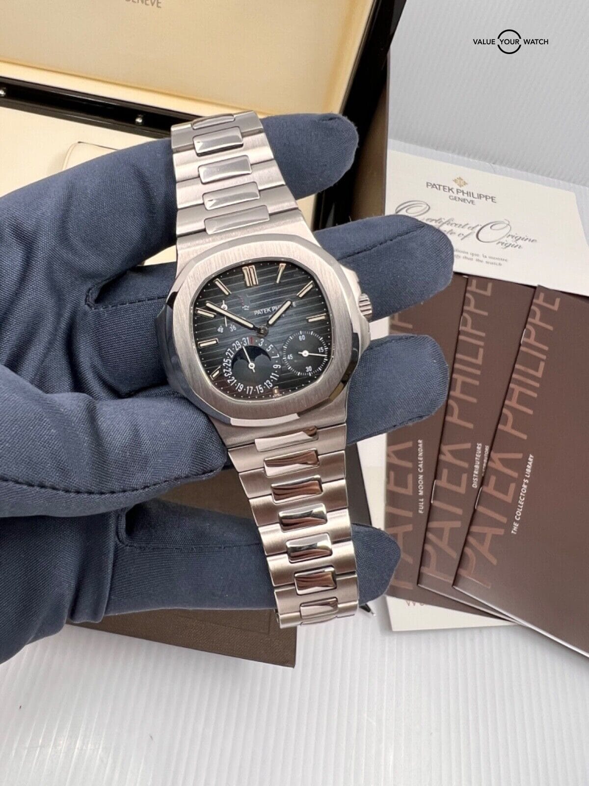 2011 Patek Philippe Blue Dial Steel Moonphase Power Reserve Nautilus 5712 Papers