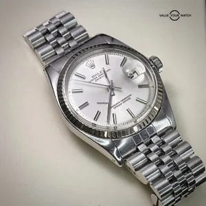 Rolex Datejust 36 silver dial fluted gold bezel jubilee bracelet