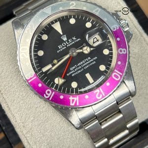 1968 Rolex GMT-Master 1675 FUSCIA INSERT Long “E” Stainless Steel Black Dial!