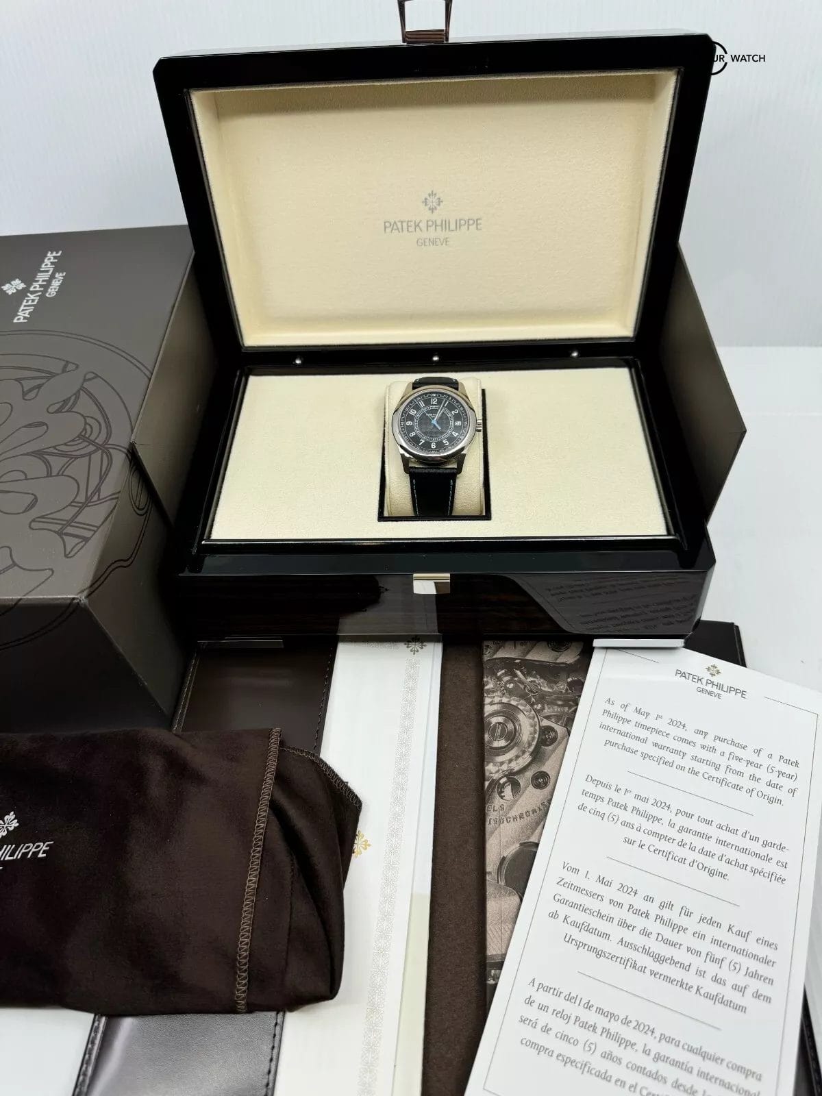 May 2024 Patek Philippe Calatrava 6007G-011 White Gold Blue Accents Carbon Dial - Image 9