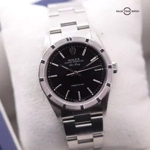 ROLEX Air king 14010 Engine Turned Bezel black Dial With CPO Card